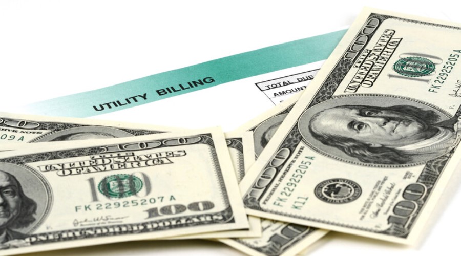 utility billing with hundred dollar bills_canstockphoto197355 900x500