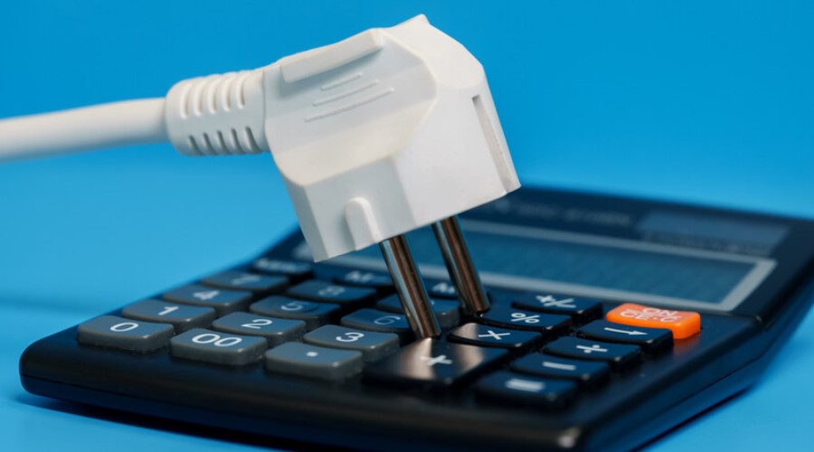 electrical plug and calculator_canstockphoto99045574 900x500